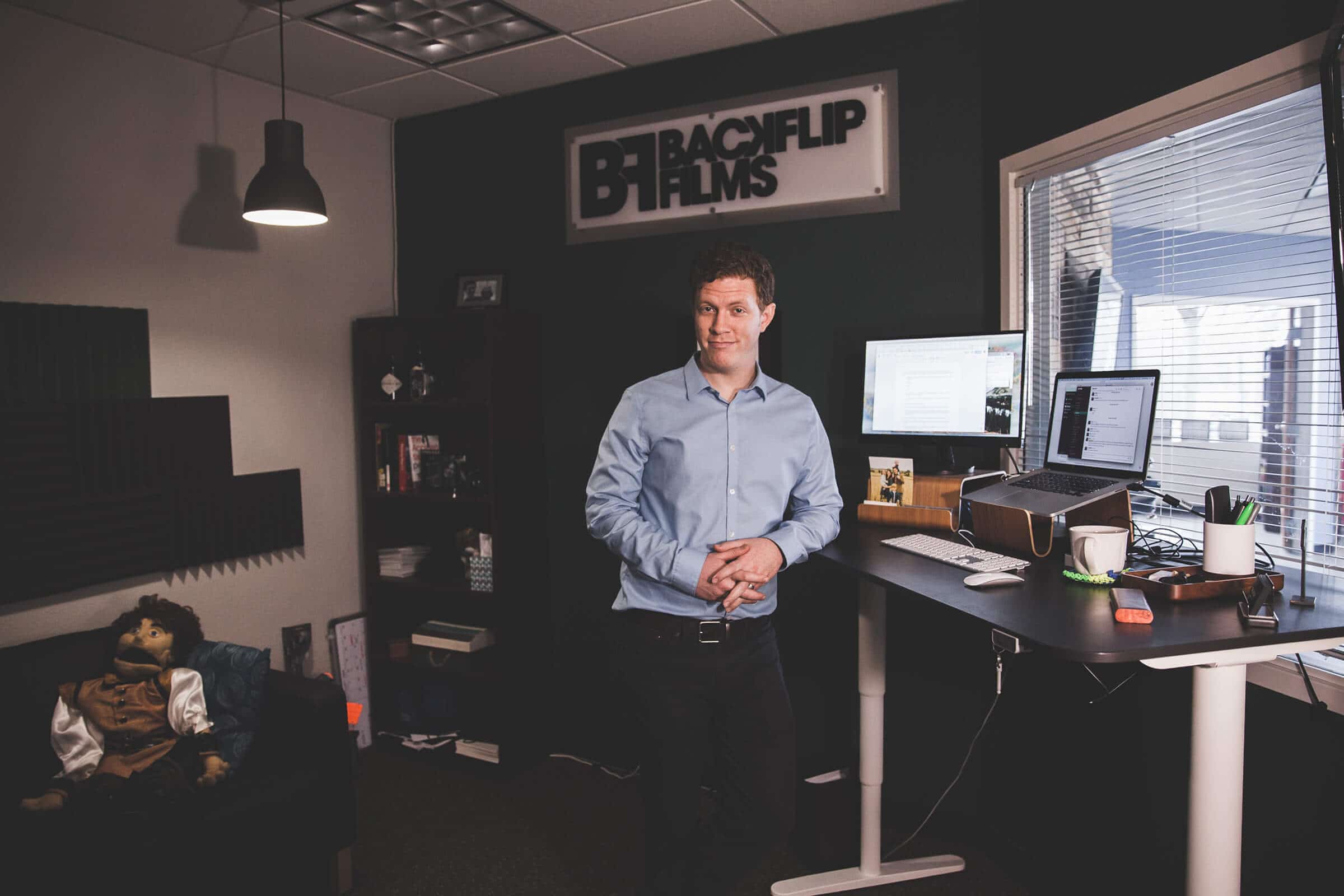 John standing in his office John standing in his office